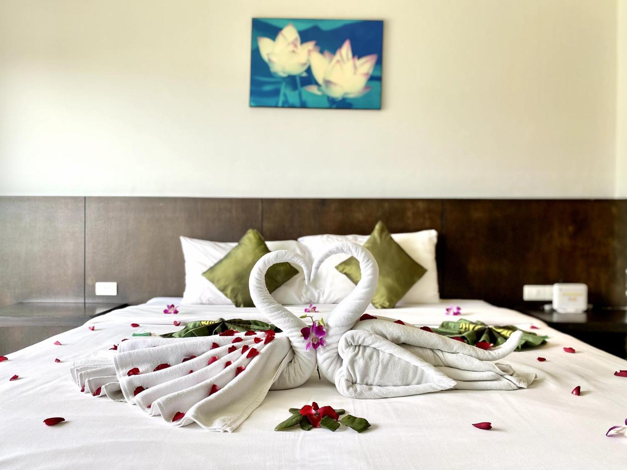 Apk Resort Patong Extérieur photo