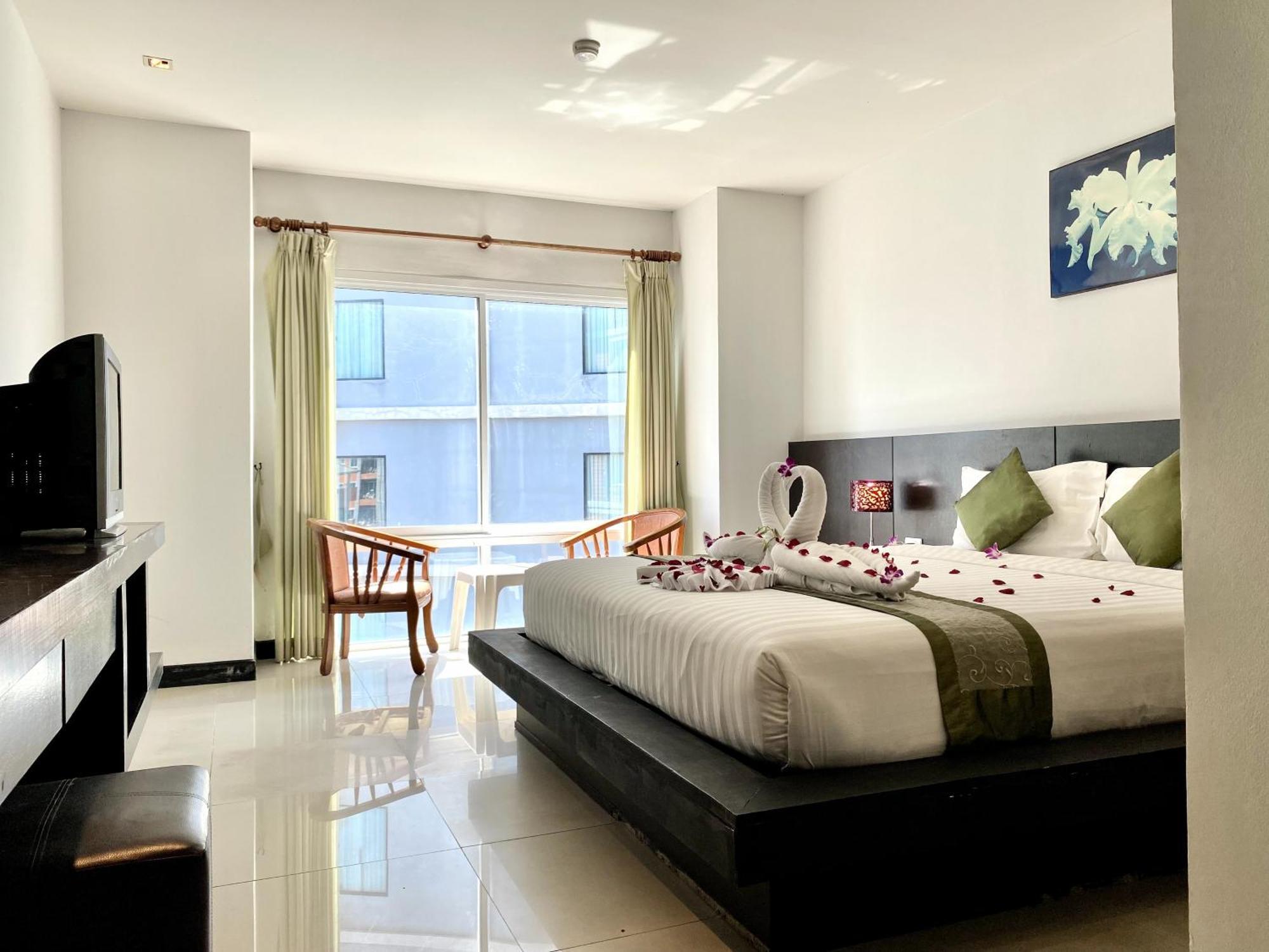 Apk Resort Patong Extérieur photo